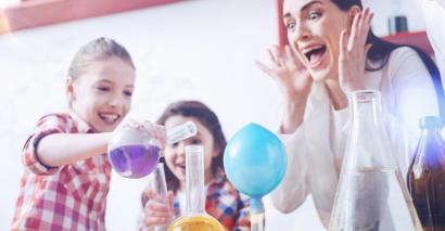 Pupils carrying out fun science experiments with science flasks.